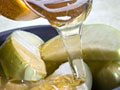 honey poured over apples