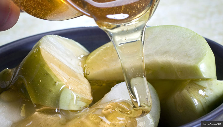 honey poured over apples
