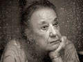 woman looking out window