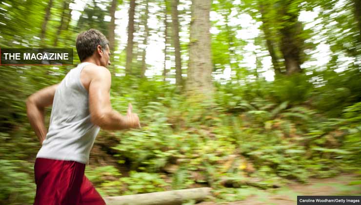 man running in the forest
