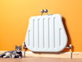 Purse shaped radiator with cat.