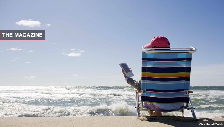 using an e reader at the beach