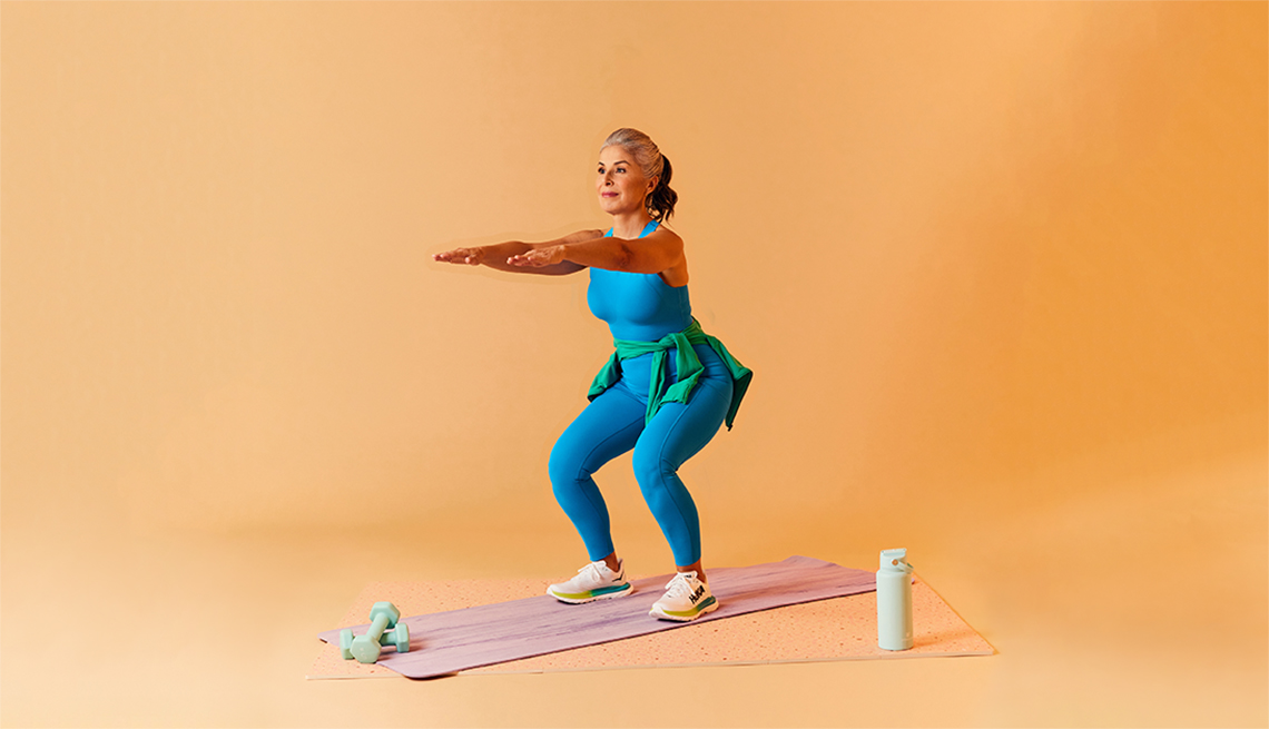 a woman performing a squat exercise