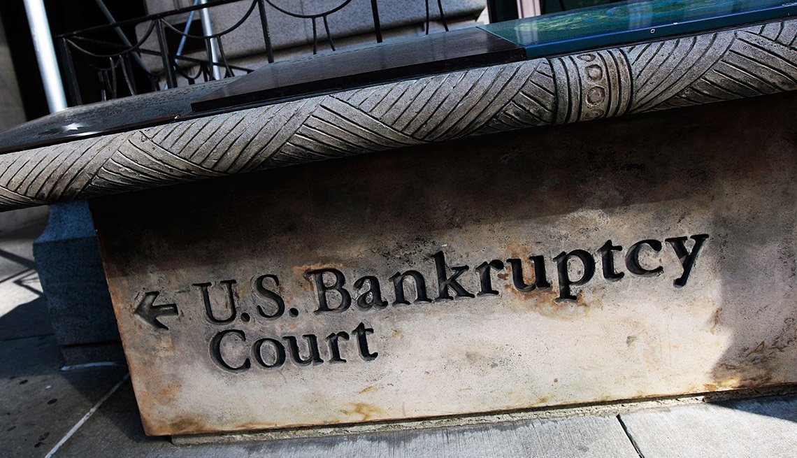     A sign with an arrow pointing to the left to the United States bankruptcy court in lower Manhattan.