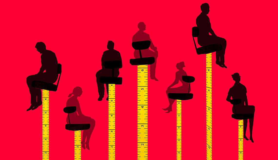 measuring tapes with people on office chairs on top and the men higher than the women