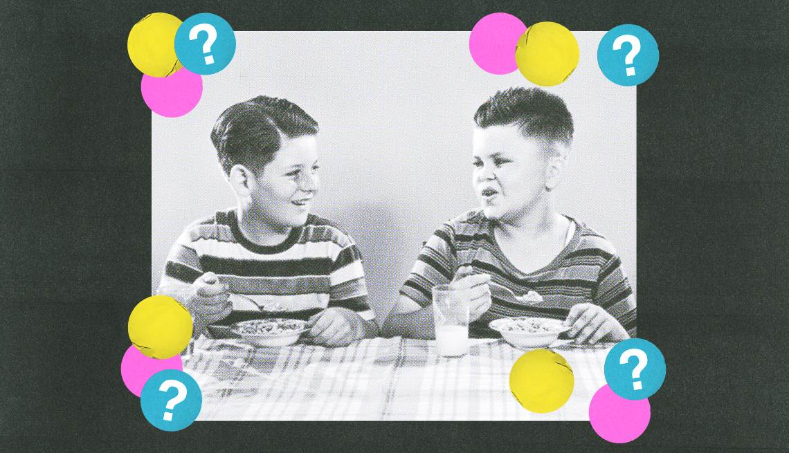 two kids sitting at table eating cereal; pink, yellow and blue circles with question marks surround them two kids sitting at table eating cereal; pink, yellow and blue circles with question marks surround them
