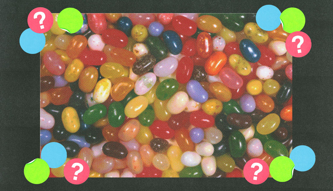numerous types of jelly beans surrounded by blue, green and pink circles with question marks numerous types of jelly beans surrounded by blue, green and pink circles with question marks