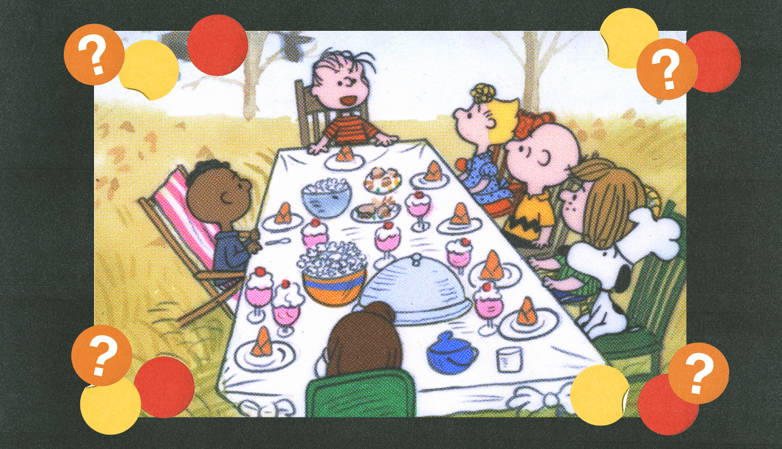 Characters of Peanuts comic sitting around rectangular table characters of peanuts comic sitting around rectangular table with food on it; yellow, red and orange circles with question marks surround them
