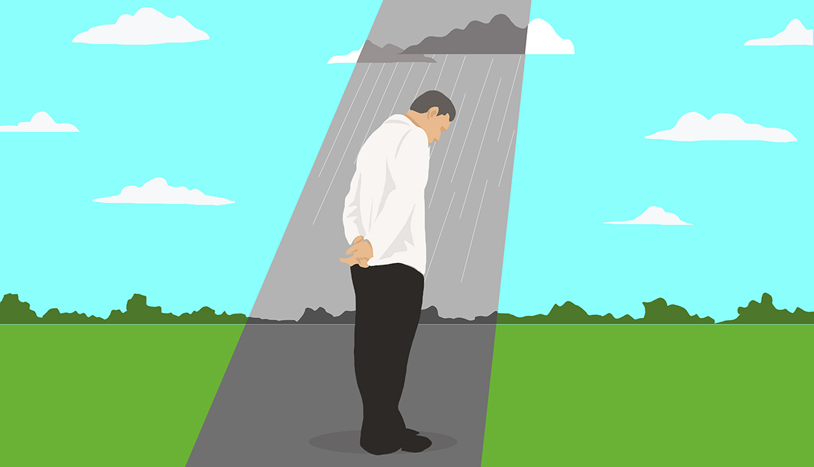 An illustration of a man getting rained on under a dark cloud on a sunny day