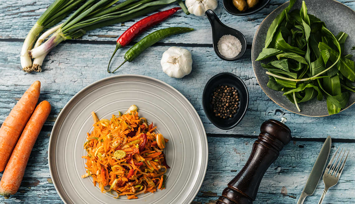 Vegetables and spices in dishes and on table vegetables and spices in dishes and on table