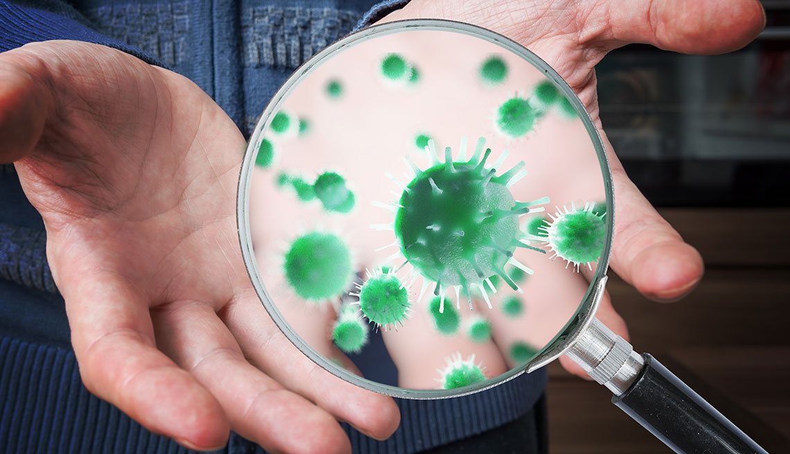 Man is showing dirty hands with many viruses and germs