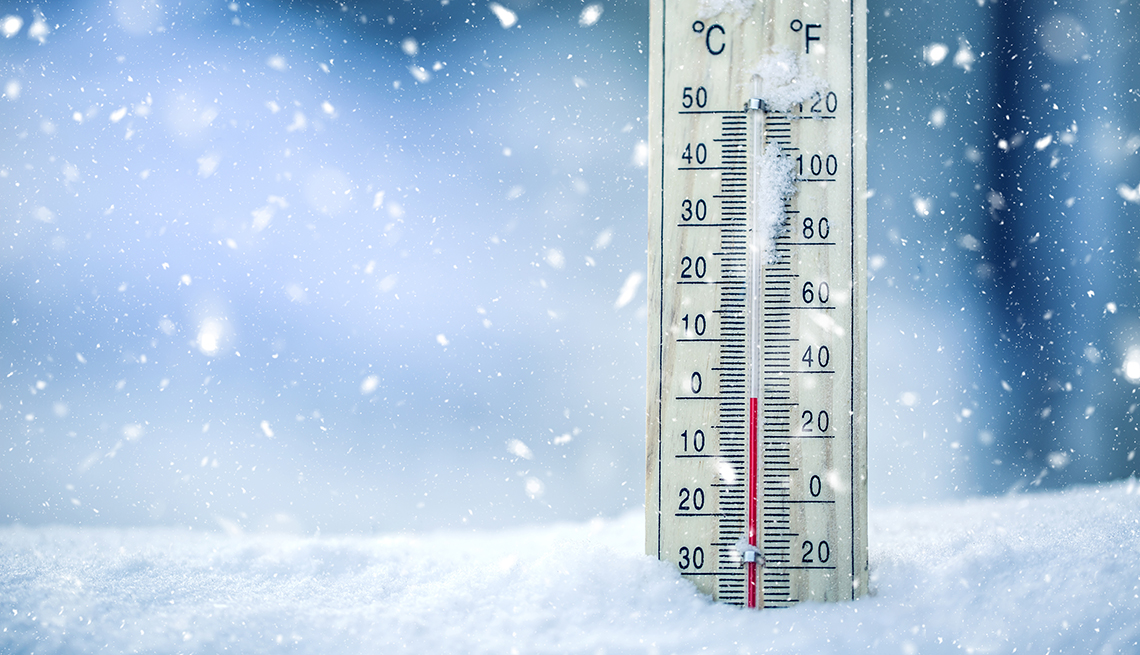Thermometer on snow shows low temperatures - zero. Low temperatures in degrees Celsius and fahrenheit. Cold winter weather - zero celsius thirty two farenheit. Thermometer on snow shows low temperatures - zero. Low temperatures in degrees Celsius and fahrenheit. Cold winter weather - zero celsius thirty two farenheit.