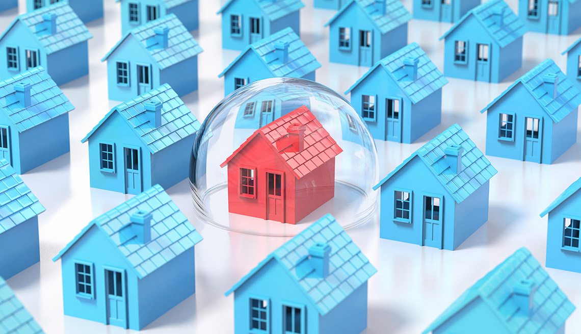 Ilustración de casas azules y una roja dentro de una burbuja.