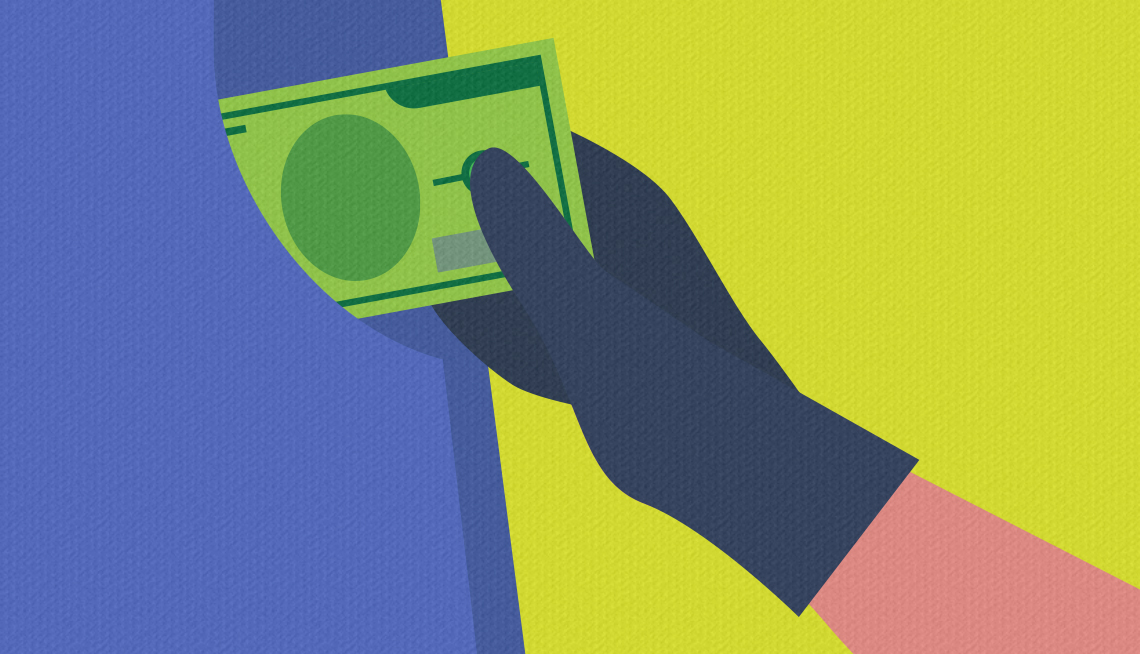 Mano roba dinero del bolsillo de los pantalones de una persona