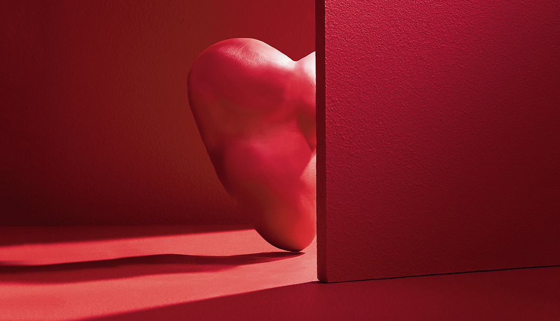 Ilustración de un corazón asomándose por detrás de una pared